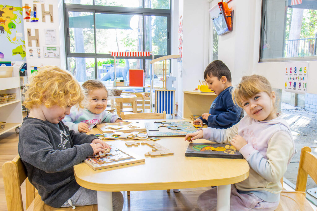Child participating in a learning activity in a classroom